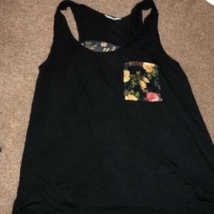 Lose black tank top with red and yellow flowers